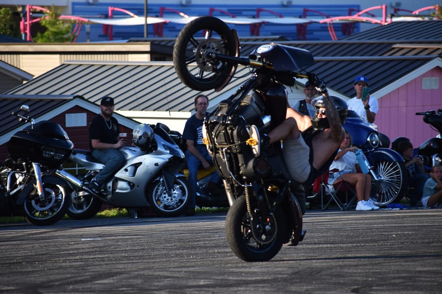 Stunt rider with the front wheel up at the Eats on 601 Bike Night