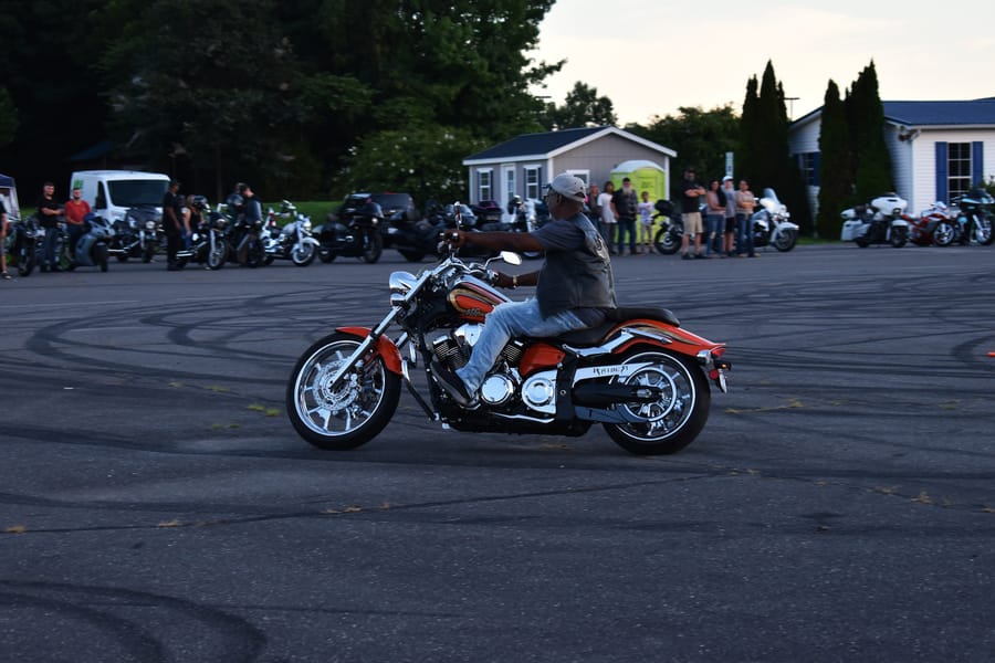 Wheelie down the straightaway during the stunt show at Bike Night at Eats on 601 in Mocksville NC