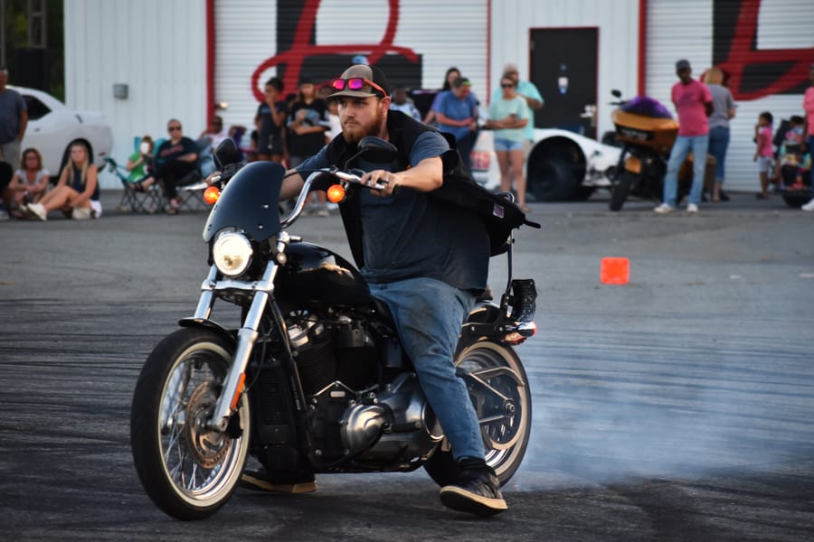 Wheelie down the straightaway during the stunt show at Bike Night at Eats on 601 in Mocksville NC
