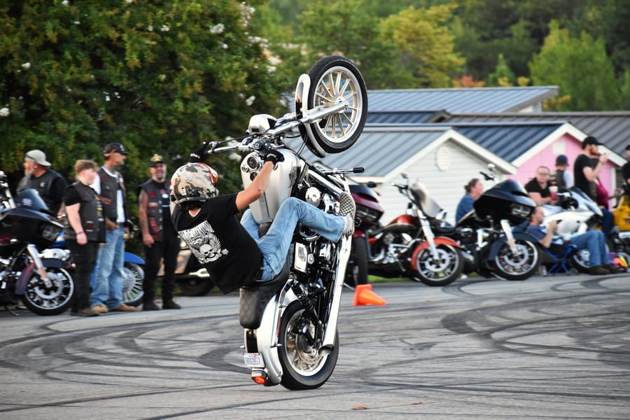 Wheelie down the straightaway during the stunt show at Bike Night at Eats on 601 in Mocksville NC