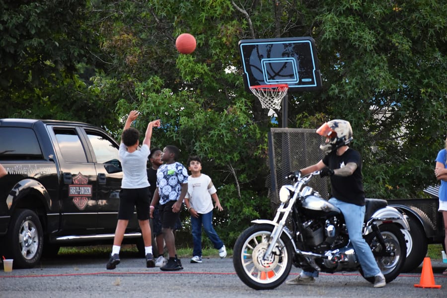 Crowd watching the stunt show at Bike Night at Eats on 601 in Mocksville NC