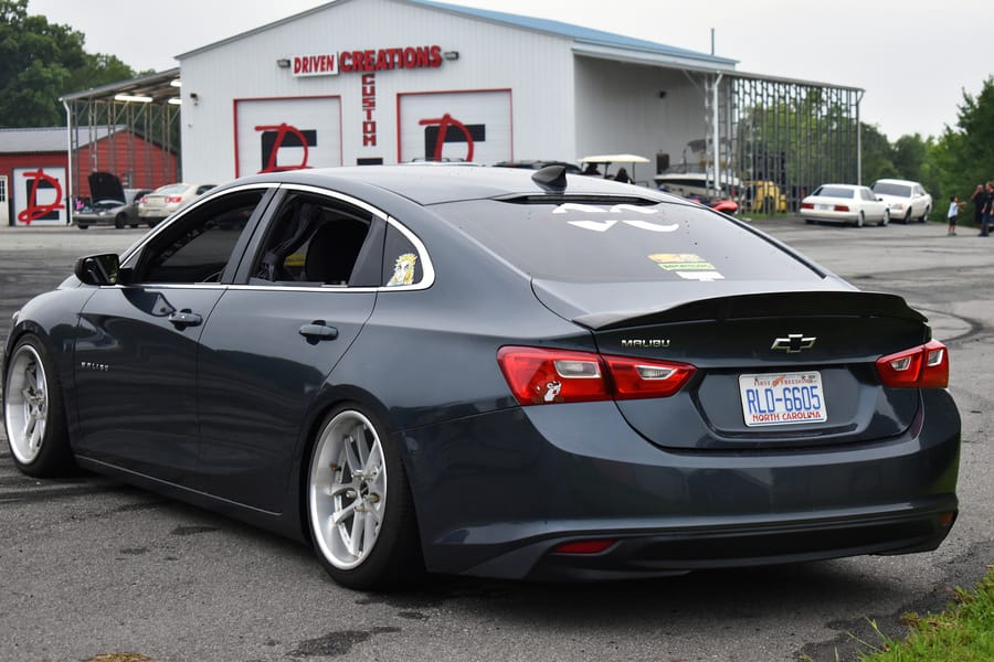 Bagged Chevy Malibu on air suspension at the Eats on 601 car meet in Mocksville NC