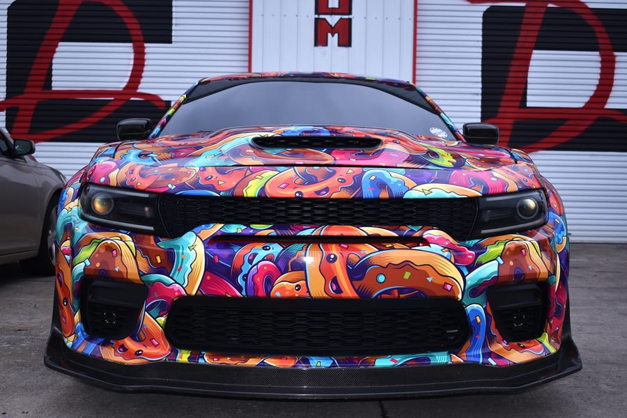Graffiti wrapped Dodge Charger at the Friday night car meet on Highway 601