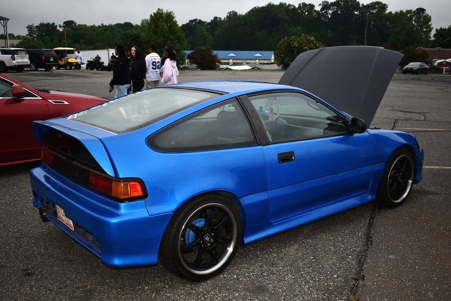 Boosted blue Honda Del Sol parked at the Honda car meet at Eats on 601 in Mocksville NC