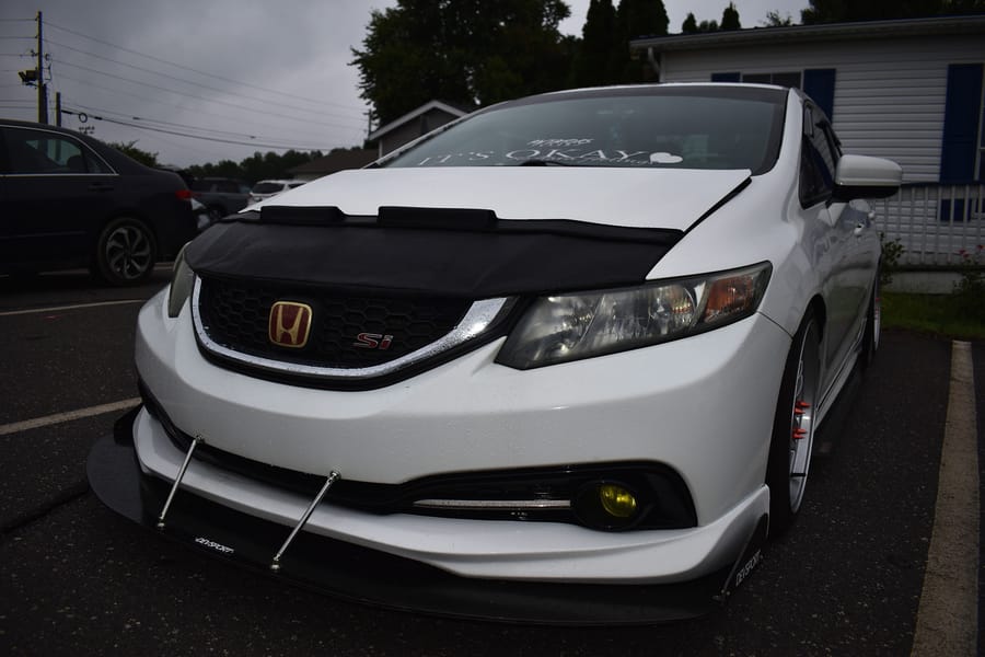 Black ninth gen Honda Civic Si at the car meet at Eats on 601 in Mocksville NC