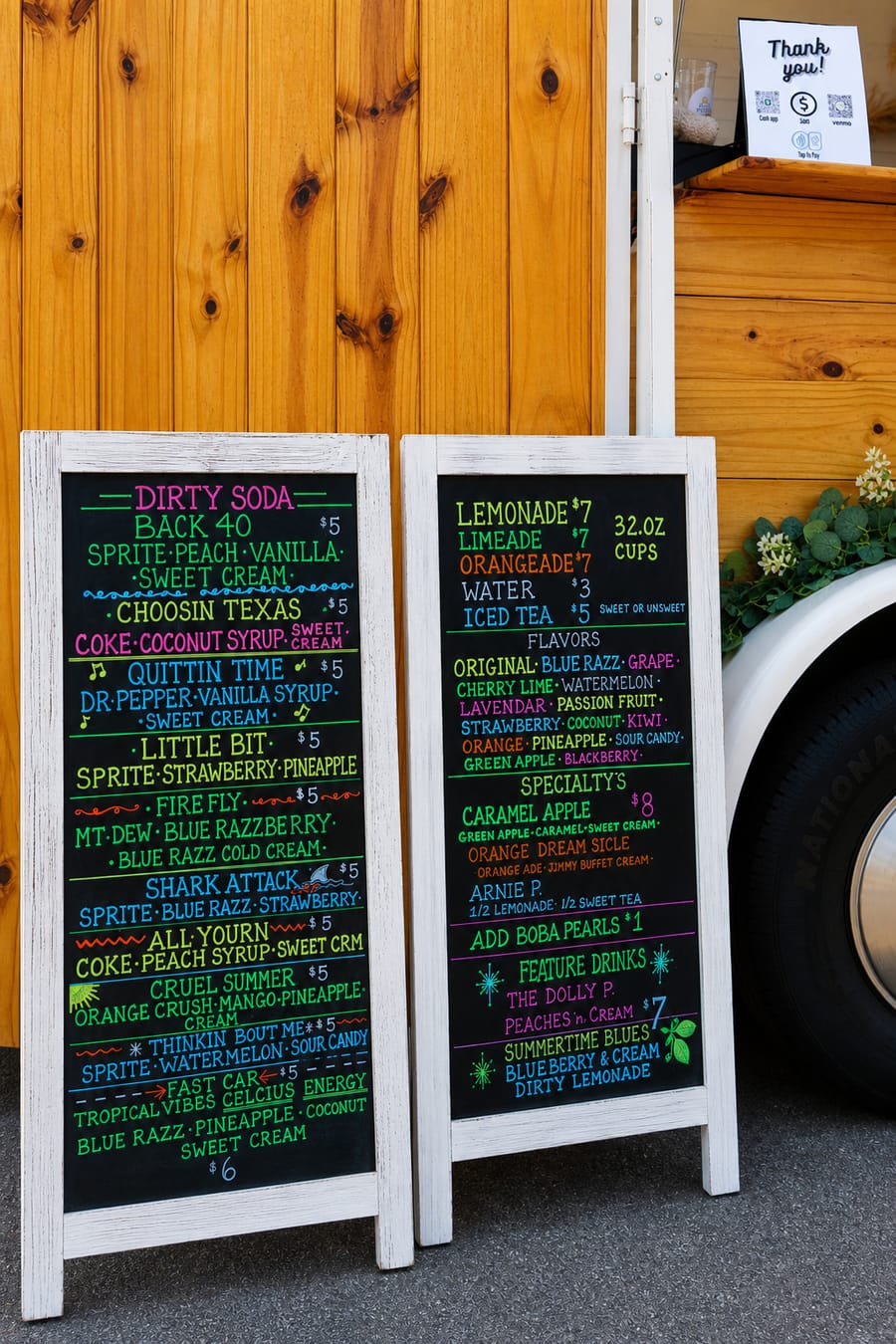 Hand-lettered chalkboard menu of dirty sodas and lemonades from Sippin' Citrus at the Jeep Jam.