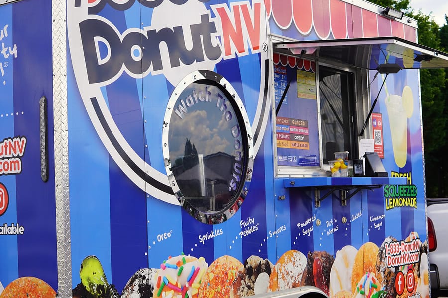 DonutNV mini-donut truck serving on the lot