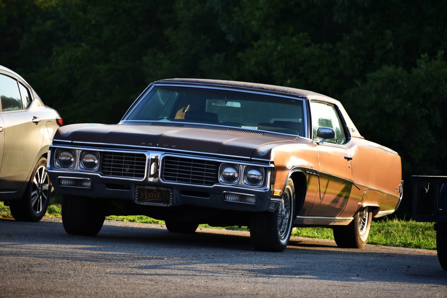 Gold and black classic Buick coupe parked on the lot at the Eats on 601 truck meet.